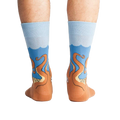 Rear view of a person wearing the Squid-O socks, showcasing the complete design on both socks.