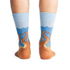 Rear view of a person wearing the Squid-O socks, showcasing the complete design on both socks.