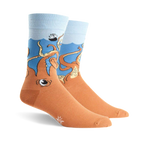 Pair of crew socks; orange body with a blue ocean top and cartoon octopus design, a sinking ship is partially visible above the octopus.