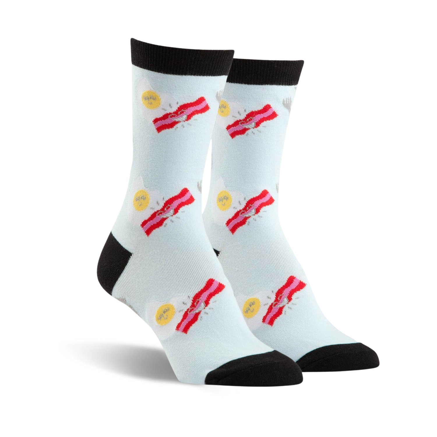 Pair of crew socks in light blue with a fun design of fried eggs and bacon strips. Black toe and heel.