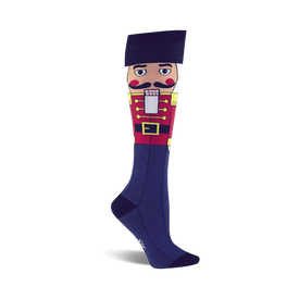 festive knee-high women's socks feature a vibrant pattern of marching nutcrackers, perfect for christmas cheer.   