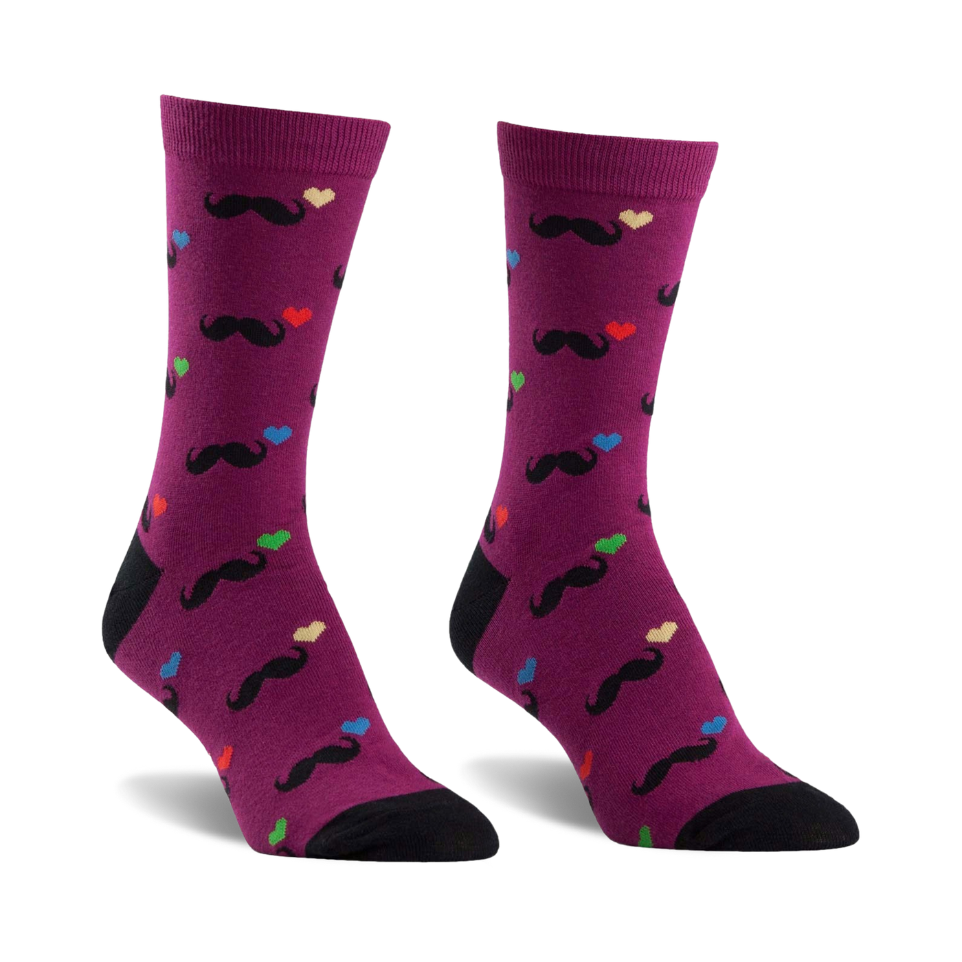 A pair of purple crew socks with a fun pattern. Black mustaches and multicolored hearts are playfully scattered across the socks, which have black heels and toes.