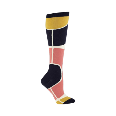 Knee-high socks in navy, dusty rose, and gold. Features a geometric Art Deco-inspired design with bold blocks of color and clean lines.