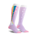 Pair of lavender knee-high socks.  One sock features a unicorn with a rainbow shooting from its rear; the other has white stars. Pink accents at the toes.