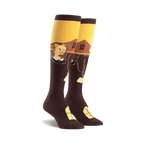 Pair of brown and gold knee-high socks featuring a depiction of Grant Wood's American Gothic painting. 
