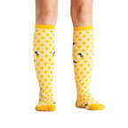 Flat lay showcasing the 'Bee's Knees' socks from above.