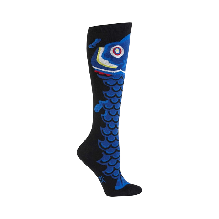 Black knee-high socks with a vibrant blue koi fish design extending from the calf to the toe.  Colorful details highlight the fish's eye and scales. }}
