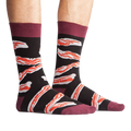A studio shot of the bacon socks laid flat, showing detail of the design.
