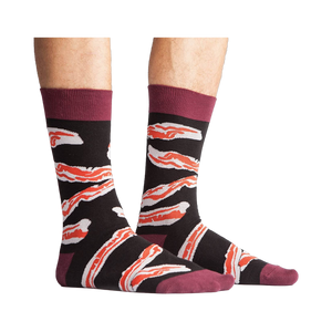 A studio shot of the bacon socks laid flat, showing detail of the design.
