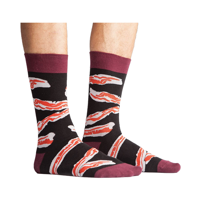 A studio shot of the bacon socks laid flat, showing detail of the design.