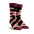 Pair of crew socks in black with a crispy bacon design and burgundy cuffs. 