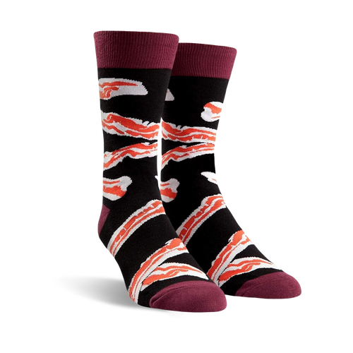 Pair of crew socks in black with a crispy bacon design and burgundy cuffs. 