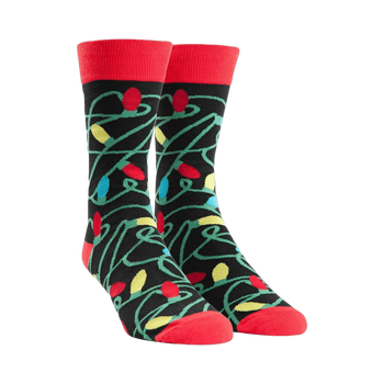 Crew socks with a tangled Christmas lights design.  Main colors are black, red, yellow, green, and blue.