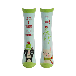 Flatlay showcasing the 'All I Want For Xmas' socks, highlighting their design and colors.