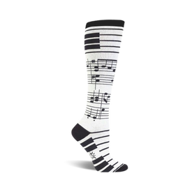 black musical notes and piano keys on a white background add a lively touch to these womens' knee-high socks.  