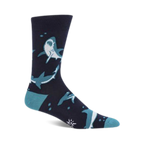 Crew socks in navy blue and teal featuring a fun shark design. The sharks are in various poses, and the background includes small bubbles.
