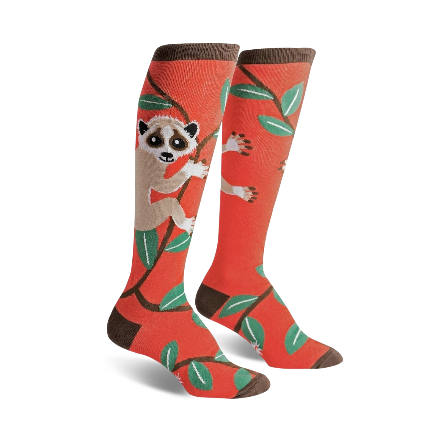 Pair of coral knee-high socks featuring a whimsical slow loris design on a branch with teal leaves. Brown sock top.