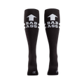 Rear view of a pair of black 'Bad Ass' knee-high socks on a person's legs.