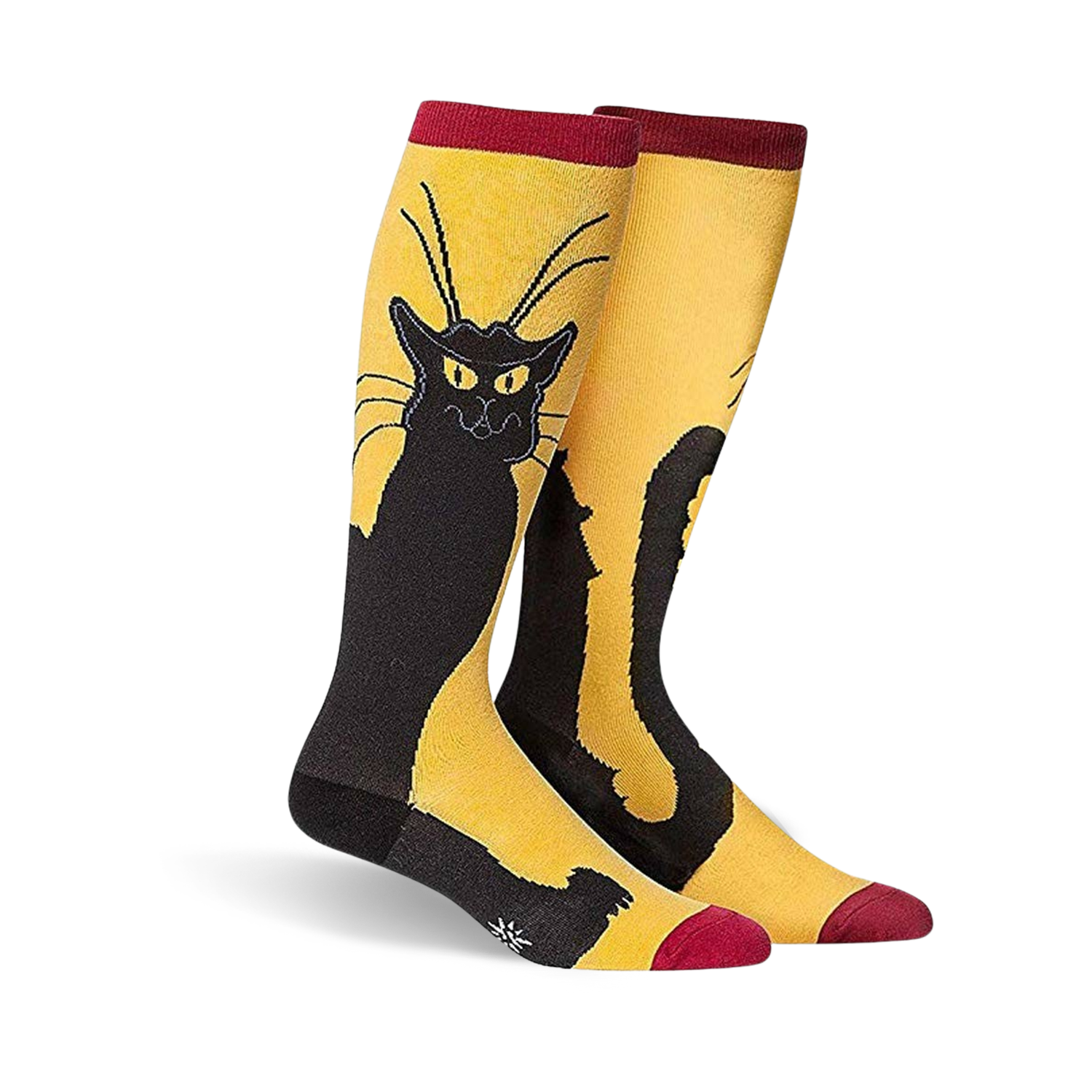 A pair of knee-high socks in mustard yellow with a black cat design. The cat is stylized and sits against the yellow background.