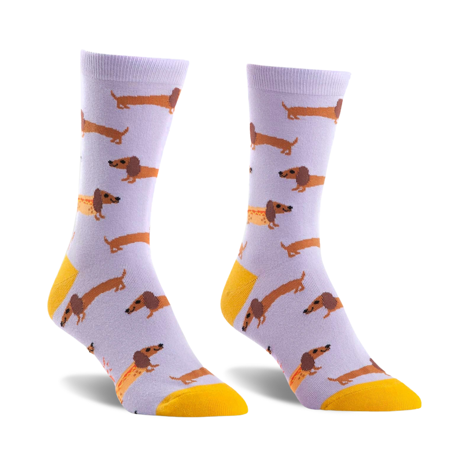 Pair of lavender crew socks featuring a repeating pattern of brown dachshunds and one dachshund shaped like a hot dog. Yellow accents at the cuffs.