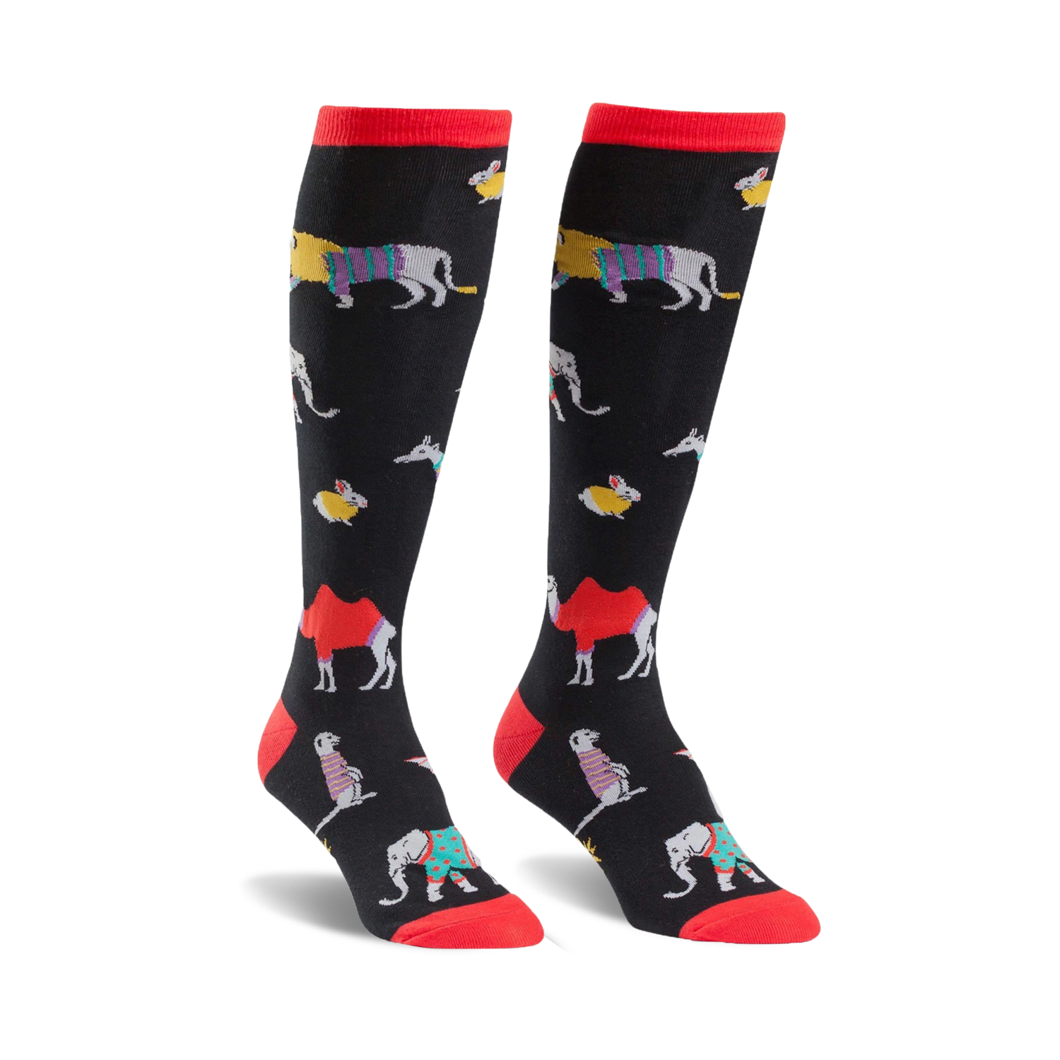 Pair of black knee-high socks with colorful animal designs including camels, elephants, and other creatures. Red tops.