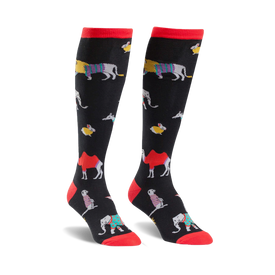 christmas sweater safari: womens knee-high black socks featuring a cartoon animal parade in christmas sweaters.  