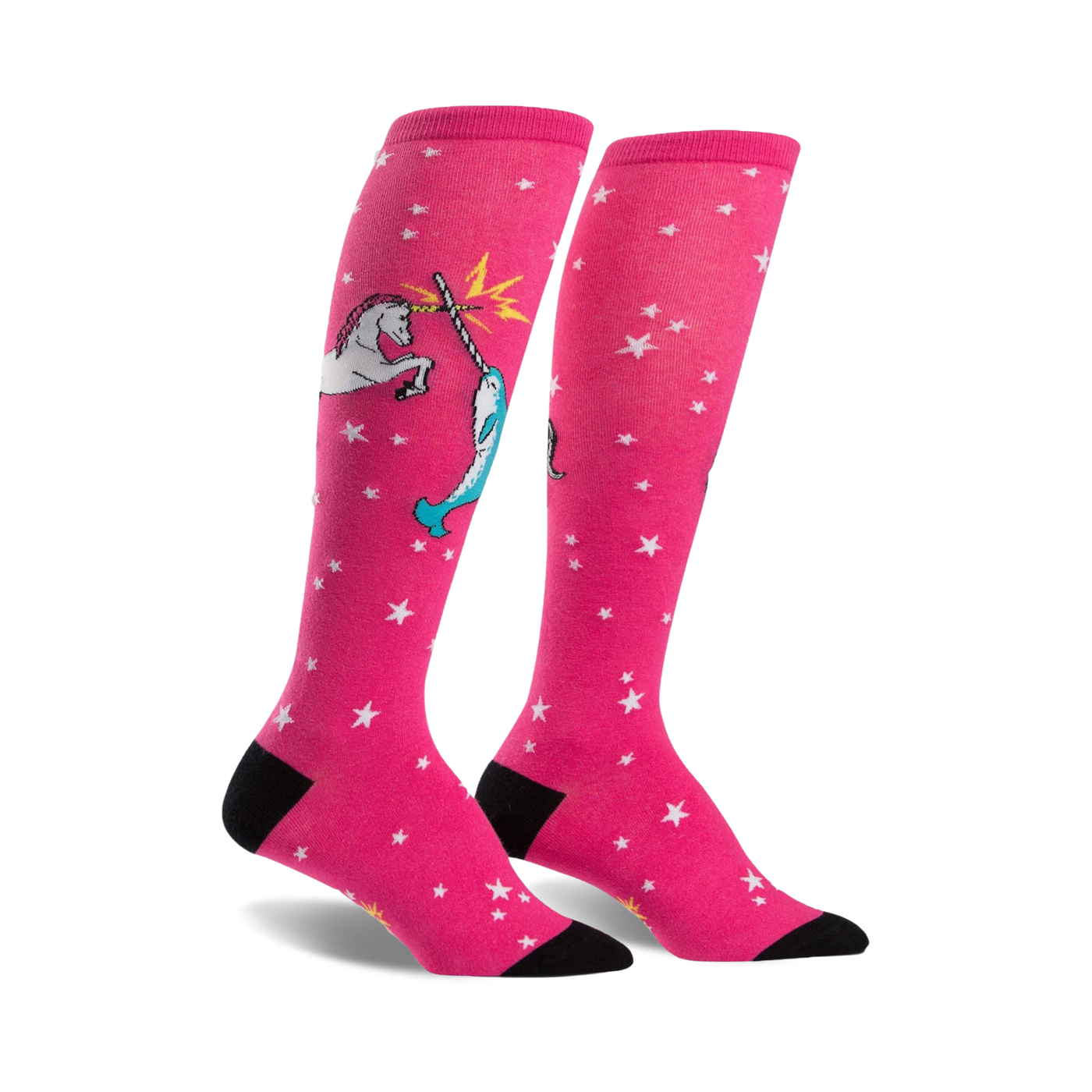 Pair of pink knee-high socks with white stars and a whimsical illustration of a unicorn fighting a narwhal.