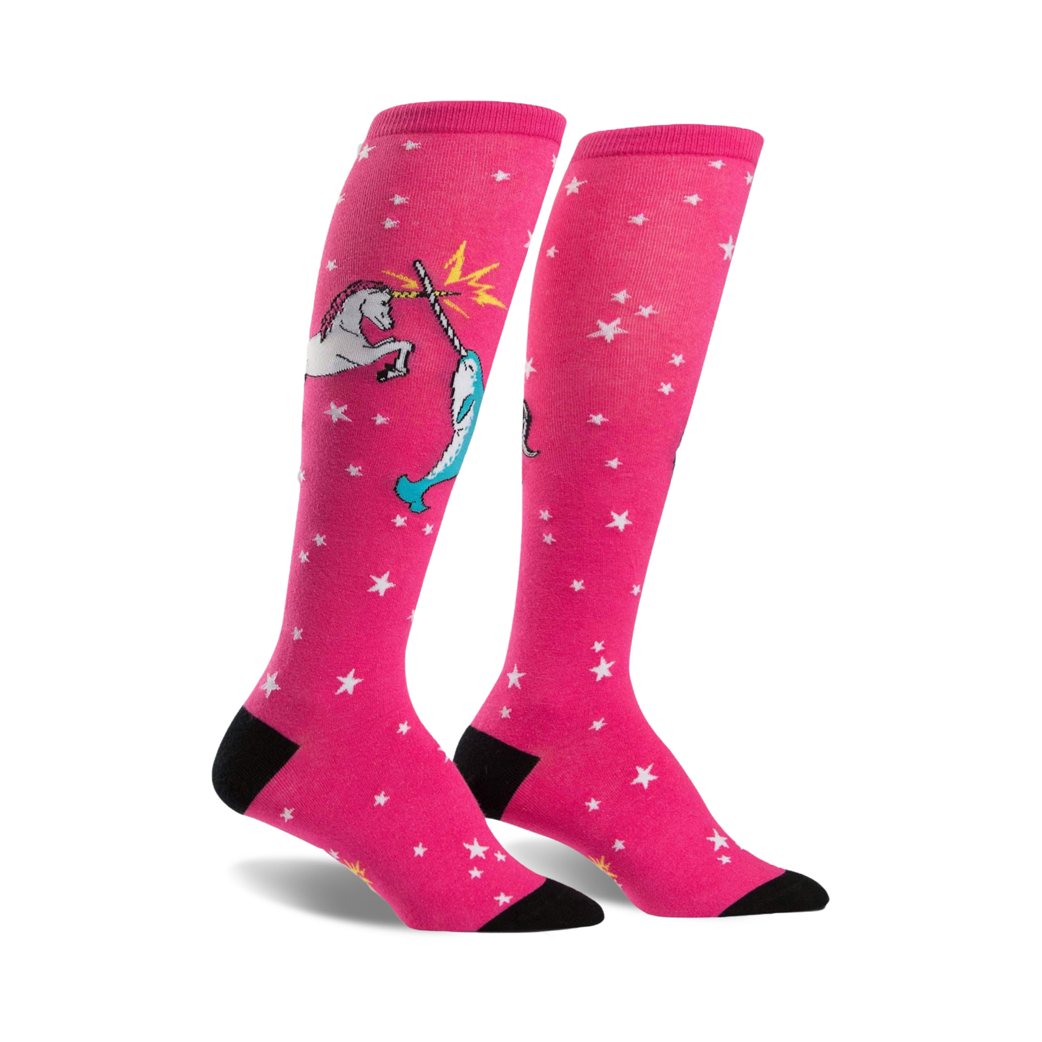 Pair of pink knee-high socks with white stars and a whimsical illustration of a unicorn fighting a narwhal.