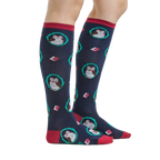 Lifestyle shot showing the Wise Owl knee-high socks on a person's legs.