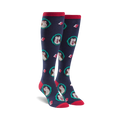 Pair of navy blue knee-high socks with a pattern of owls wearing glasses and surrounded by teal wreaths and books.