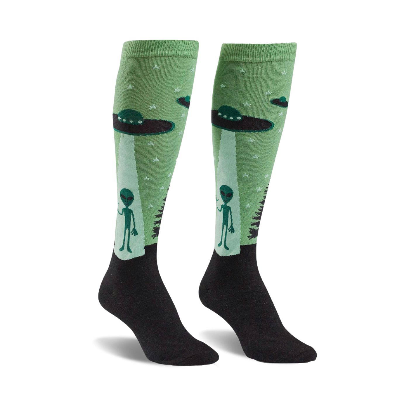 Pair of pastel green knee-high socks with aliens and UFOs. Black cuff. Fun, quirky design.