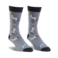 Gray crew socks featuring a whimsical design of unicorns and narwhals battling with sparks. Black cuffs.