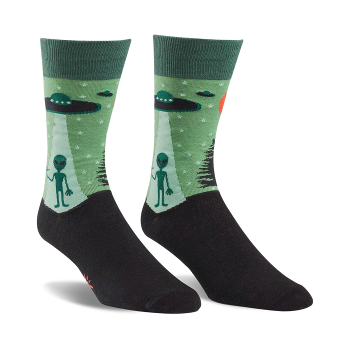 mens dark green crew socks with ufos, aliens, trees, and stars   }}