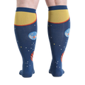 Rear view of a person wearing Planets knee-high socks, showcasing the back design.