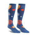 Pair of knee-high socks; navy blue with colorful planets, stars, and a yellow sun design.