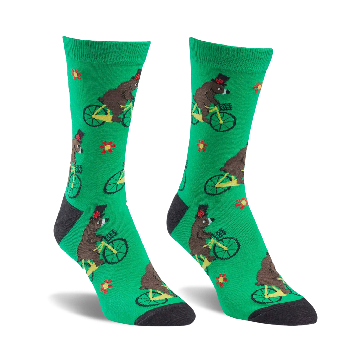 Crew socks in green featuring brown bears wearing top hats riding yellow bicycles.  Small red flowers are scattered on the background.