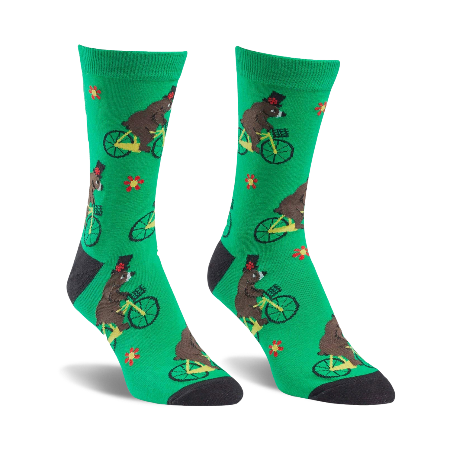 Crew socks in green featuring brown bears wearing top hats riding yellow bicycles.  Small red flowers are scattered on the background.