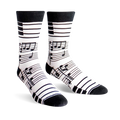 Pair of white crew socks with black musical notes and piano keys design. Black cuff.