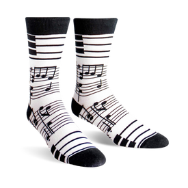 black crew socks with musical notes, piano keys, and treble clefs. perfect for music lovers.  