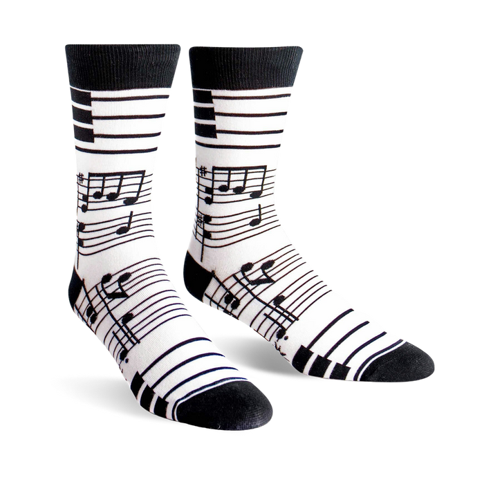 black crew socks with musical notes, piano keys, and treble clefs. perfect for music lovers.   }}