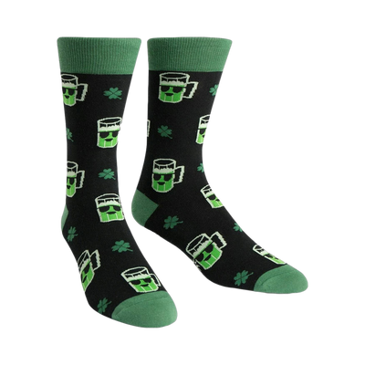 Crew socks, black with green beer mug and shamrock pattern, green cuffs.