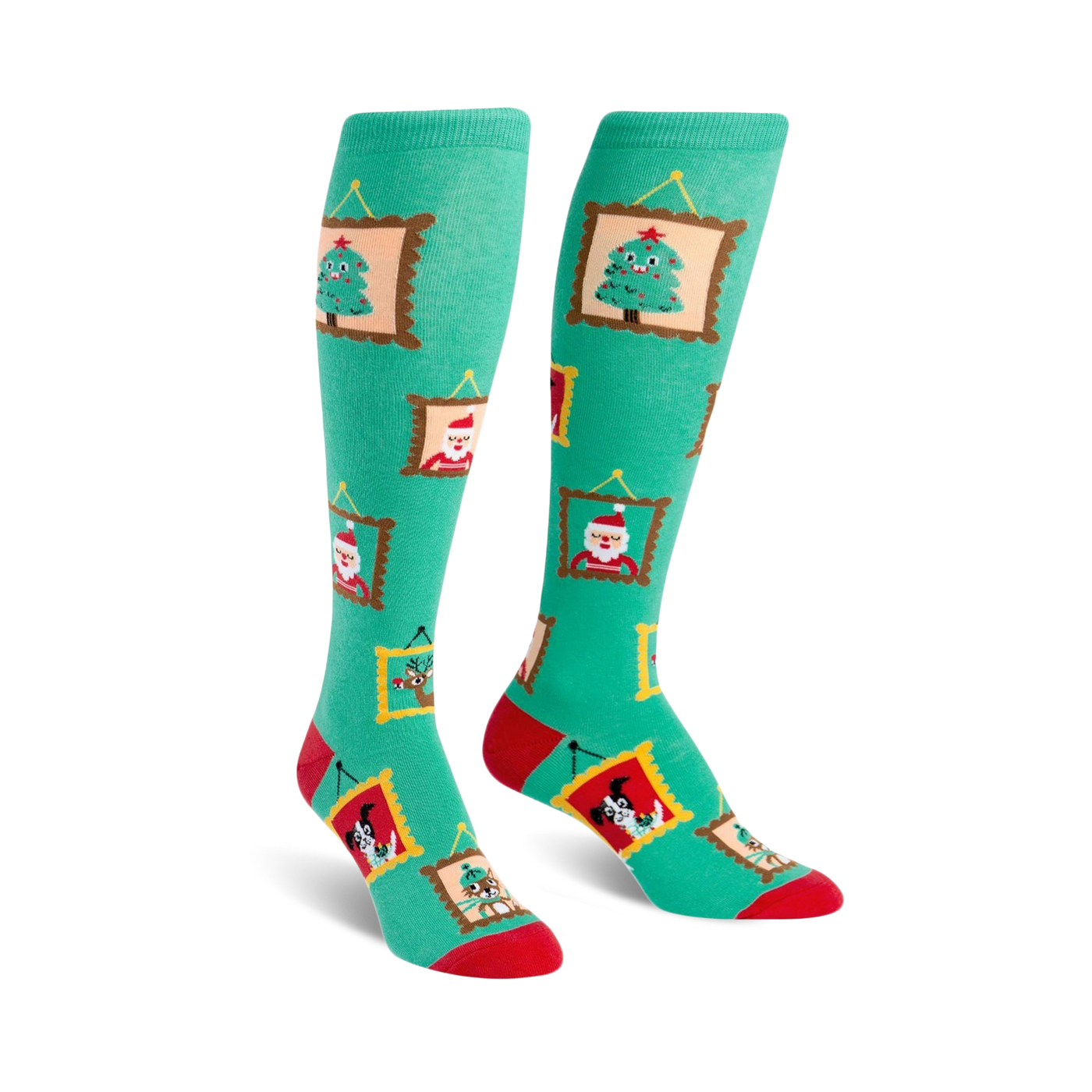Pair of teal knee-high socks with red and gold accents. Festive designs in gold frames include a Christmas tree, Santa, reindeer and a dog.