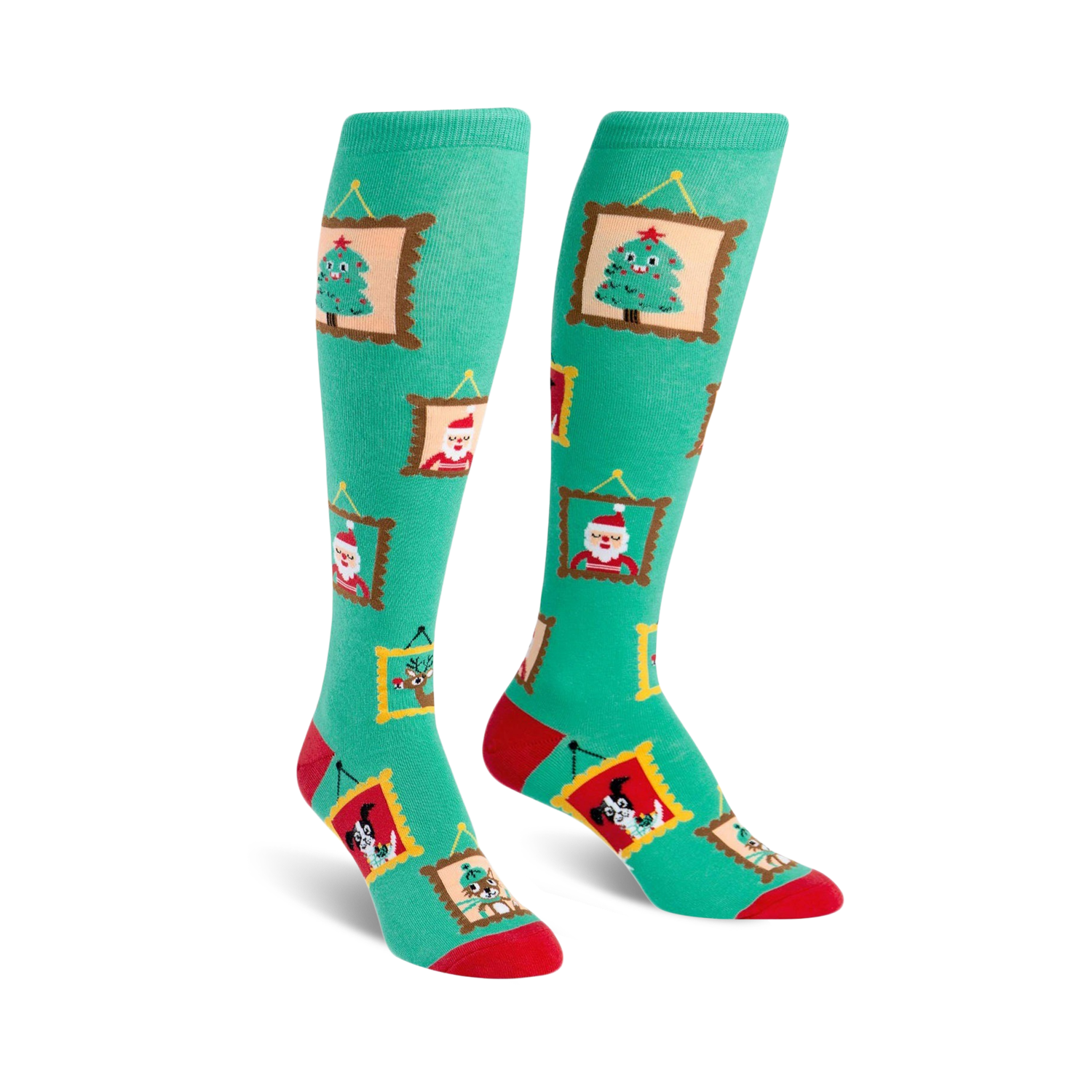 Pair of teal knee-high socks with red and gold accents. Festive designs in gold frames include a Christmas tree, Santa, reindeer and a dog.
