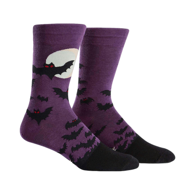 Purple crew socks with a black bat design and a full moon.  Black heel and toe.  Spooky and fun!