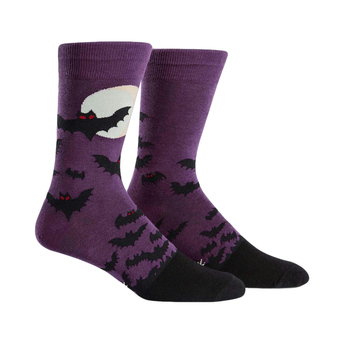 Purple crew socks with a black bat design and a full moon.  Black heel and toe.  Spooky and fun! }}