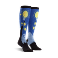 Pair of knee-high socks showcasing Van Gogh's Starry Night.  Blues, yellows, and blacks are prominent in the design, with swirling brushstrokes and stars.