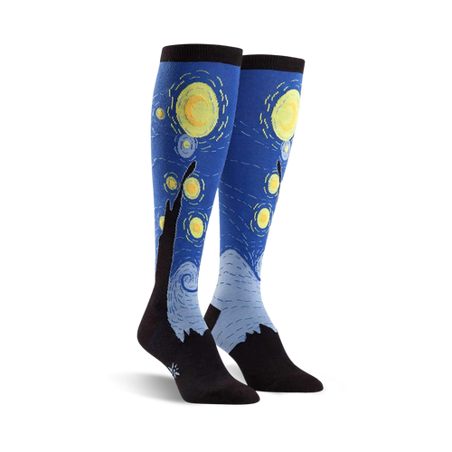 Pair of knee-high socks showcasing Van Gogh's Starry Night.  Blues, yellows, and blacks are prominent in the design, with swirling brushstrokes and stars.