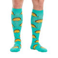 Flat lay of the Tacosaurus knee-high socks on a white background.