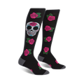 Pair of black knee-high socks with a colorful sugar skull and pink roses pattern. 