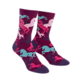 Crew socks featuring a maroon background with a pattern of pink, teal, and purple unicorns.